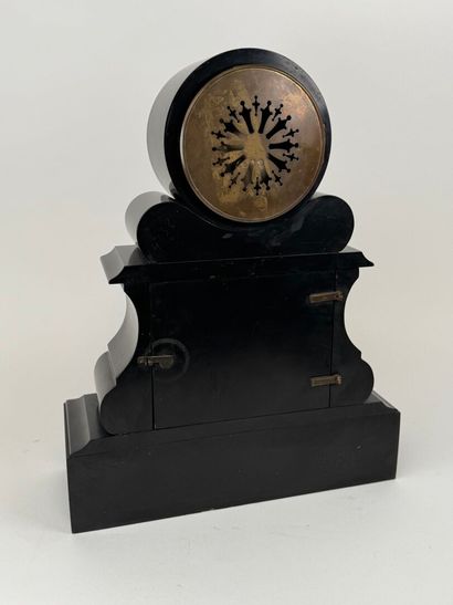 Black and polychrome marble clock featuring...
