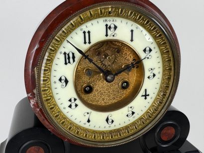 Black and polychrome marble clock featuring...