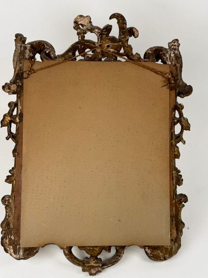 Small mirror in wood and gilded stucco, with...