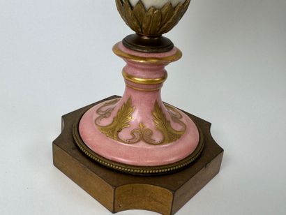 A large polychrome and gold porcelain vase...