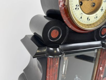 Black and polychrome marble clock featuring...