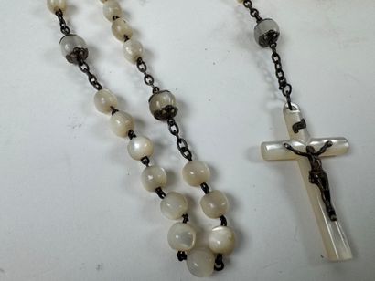 Mother-of-pearl and metal rosary, presented...
