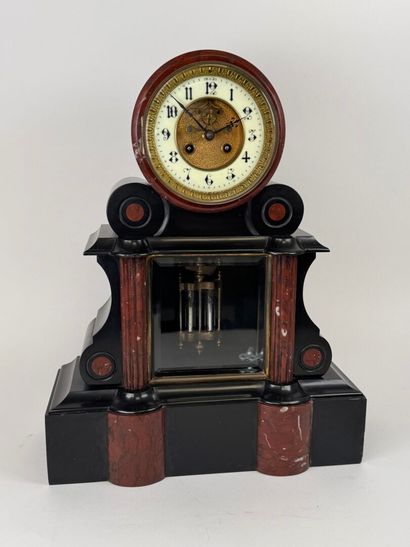Black and polychrome marble clock featuring...