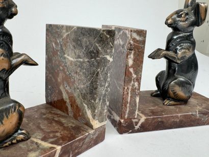 Pair of bookends in patinated regula with...