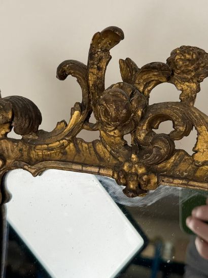 Small mirror in wood and gilded stucco, with...