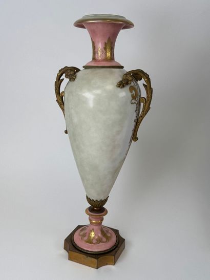 A large polychrome and gold porcelain vase...