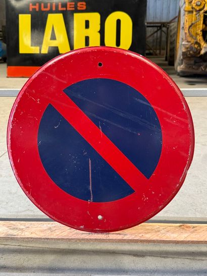 Circular no-parking sign in polychrome painted...