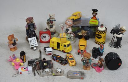 Set of photography-themed toys including...