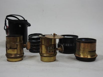 Set of five camera lenses, three in brass:...