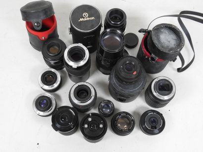 Set of more than a dozen different lenses,...