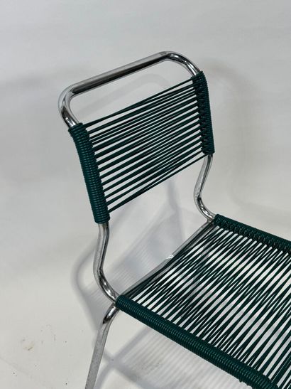 Chair with chromed metal tubular frame, back...