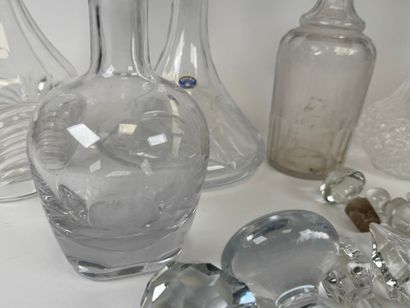 Seven glass and crystal decanters.
H. 30...