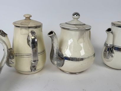 LANGEAIS.
Seven pieces in cream and silver...