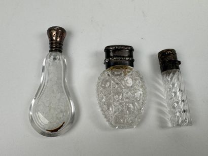 Three crystal and cut-glass salt flasks,...