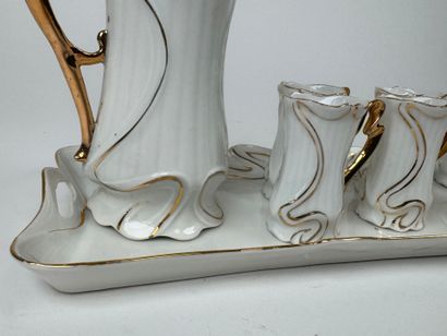 Small white and gold porcelain liqueur service...