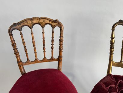 Two charivari chairs in molded and gilded...