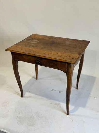Small rustic table in molded walnut opening...