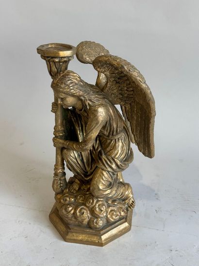 Carved and gilded wood archangel forming...