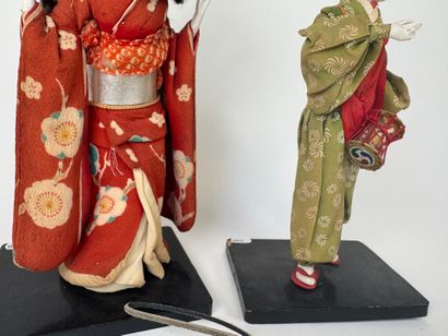 ASIA, 20th century.
Two figures in traditional...