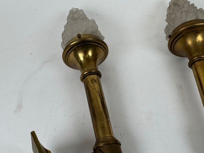 Pair of bronze sconces in the shape of a...