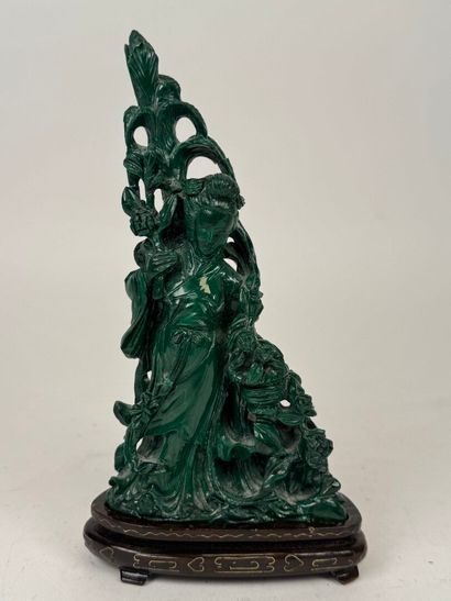 CHINA, 20th century.
Woman with flowers.
Carved...