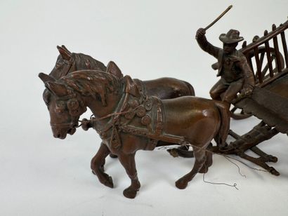 Small regule subject depicting a carriage.
11...