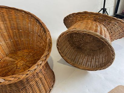 Three wicker armchairs, wraparound back and...