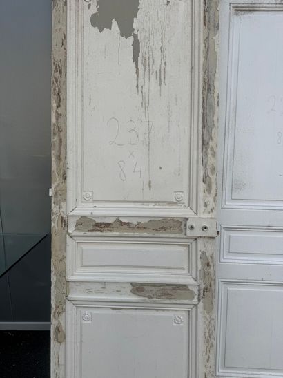 Suite of eight doors in molded and painted...