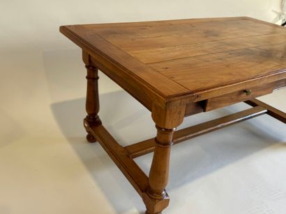 Coffee table opening with two drawers in...