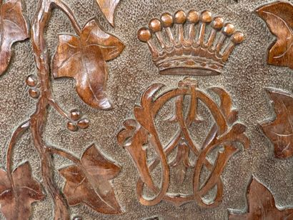 A two-plate folio in carved wood with the...