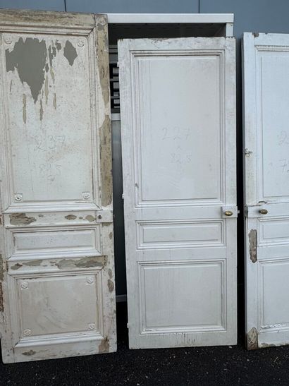 Suite of eight doors in molded and painted...