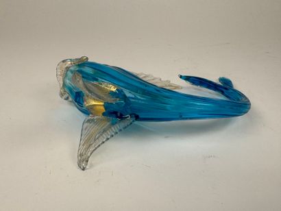 A blown glass subject, partially colored...