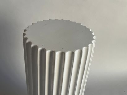 Enameled porcelain saddle with fluted half...