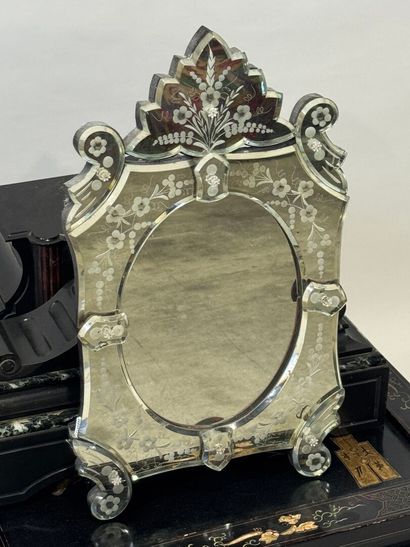 Venice mirror with beveled and chased glass...