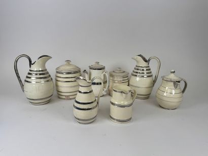 LANGEAIS.
Eight cream and silver earthenware...