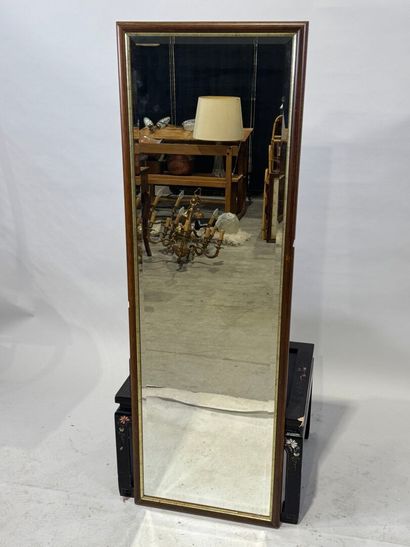 Rectangular mirror in stained wood with gilded...