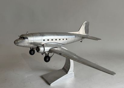 20th century school. 
Douglas DC-3 aircraft....