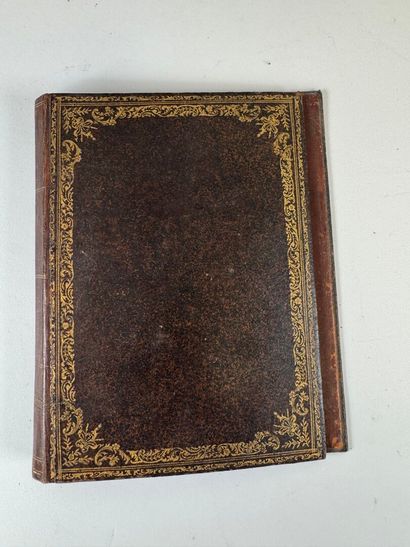 Leather desk set with gold embossed foliate...