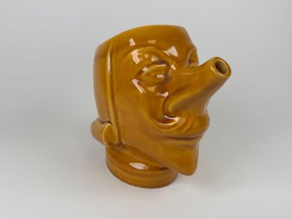 Yellow-glazed earthenware pitcher with Cyrano...