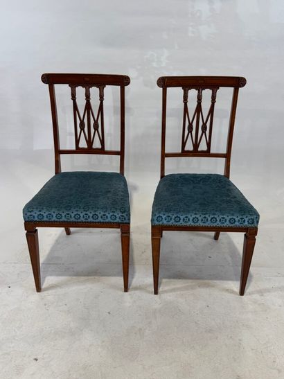 Pair of molded wood chairs with openwork...