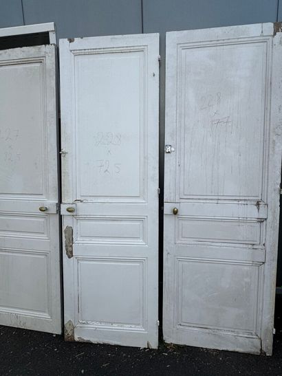 Suite of eight doors in molded and painted...