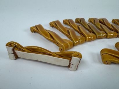 Set of 12 earthenware knife-holders with...