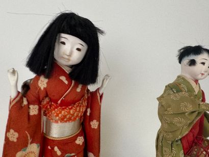 ASIA, 20th century.
Two figures in traditional...