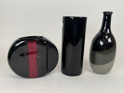 Set of two ceramic vases and a bottle with...