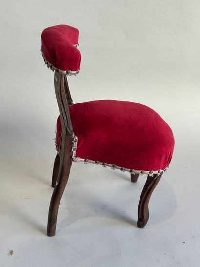 Molded wood chair with red velvet seat cover...