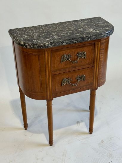Small half-moon chest of drawers in wood...