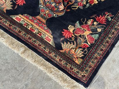 GHOUM.
Handmade silk carpet decorated with...