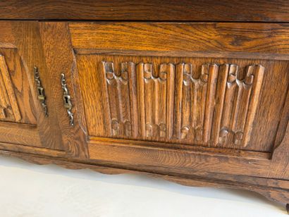 Moulded and carved oak chest opening with...