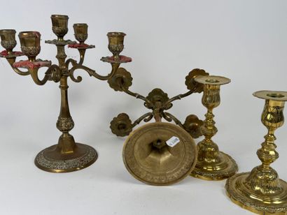 Two pairs of brass torches or candlesticks,...