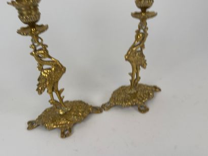 Pair of chased brass torches decorated with...